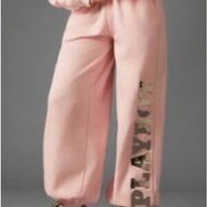 PLAYBOY Pink joggers with silver metallic Logo